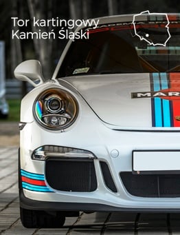 Zbliżenie na okrągły reflektor Porsche 911 GT3